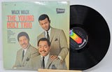 Vinyl record and cover of 'Wack Wack' by The Young Holt Trio with a white background
