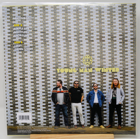 Back cover of Young Man Winter Leading Light vinyl album with band members posed against a brick wall