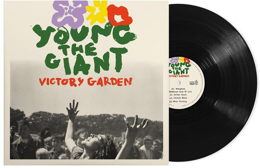 Vinyl record with 'Young the Giant' album cover featuring a crowd and colorful text.
