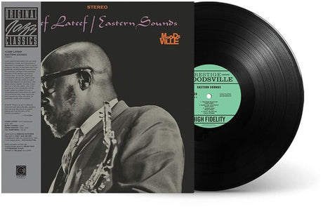 Vinyl record with a jazz musician on the cover and a green label.