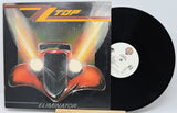 Vinyl record with ZZ Top 'Eliminator' album cover featuring a car design.