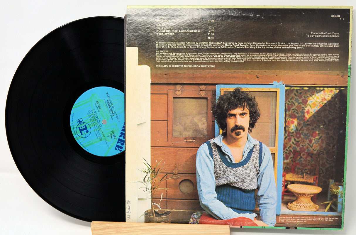 'Vinyl Record and Back Cover' Vinyl record with cover featuring Zappa in front of a cabin