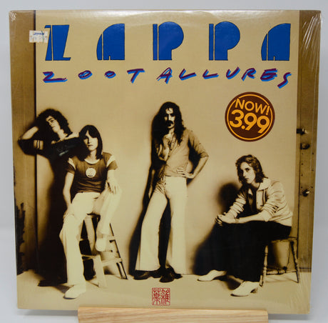 Album cover for 'Zappa Lost Allures' with four people and a price tag on a beige background. Original pressing still sealed.