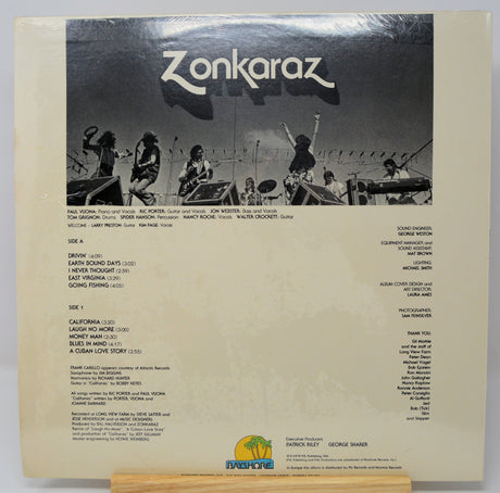 Back cover of a vinyl record with 'Zonkaraz' branding and black and white photo of people playing instruments.