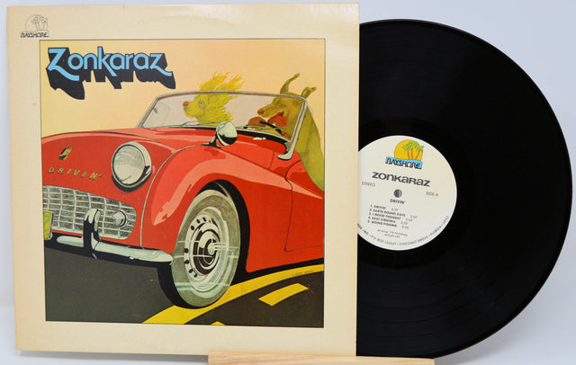 Vinyl record with a colorful cover featuring a red car and 'Zonkaraz' branding.