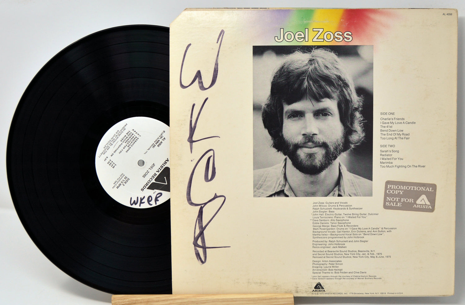 Vinyl record by Joel Zoss and the back cover with a picture of him and text.