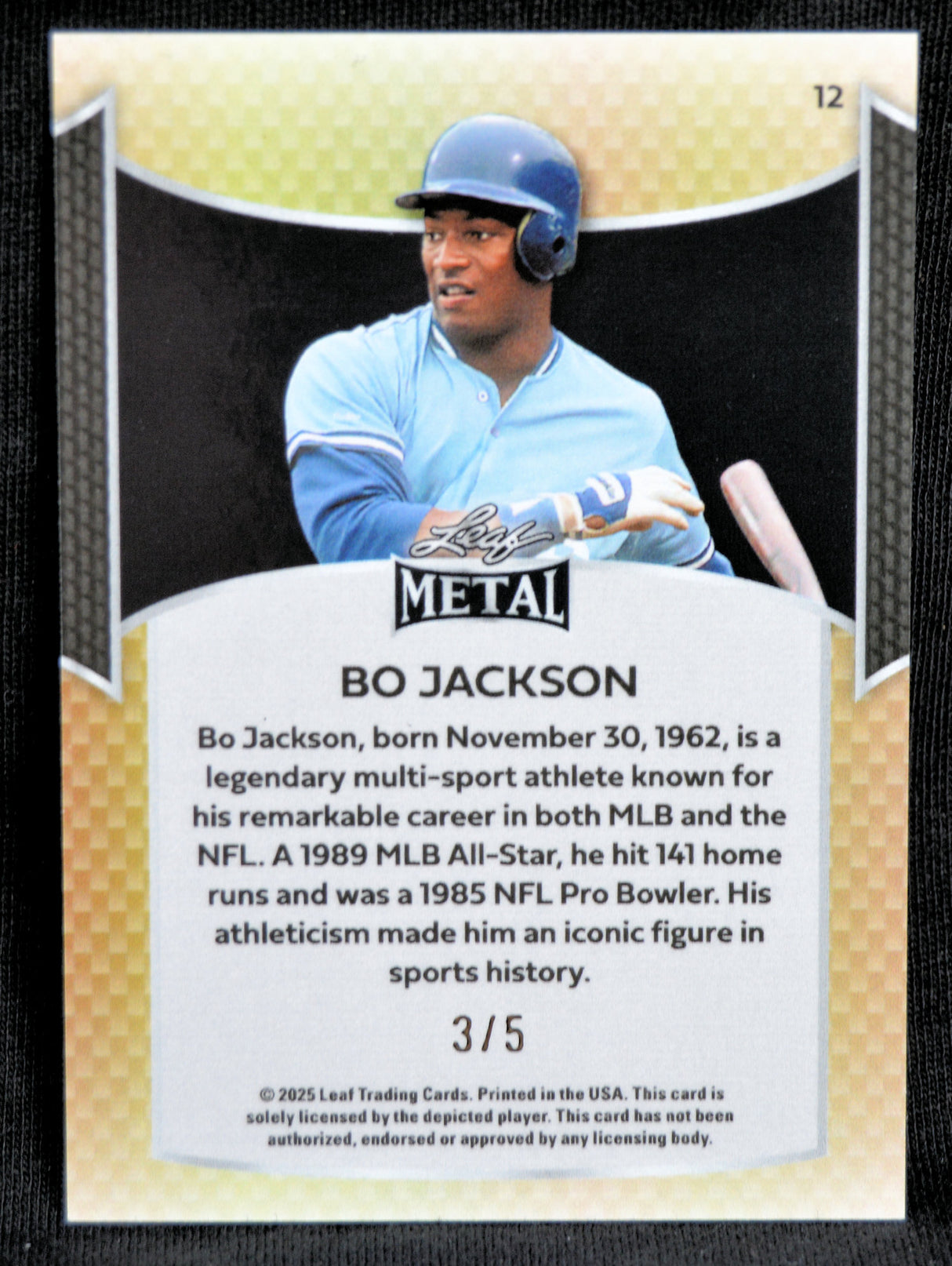Baseball trading card of Bo Jackson with a brief bio on a beige background