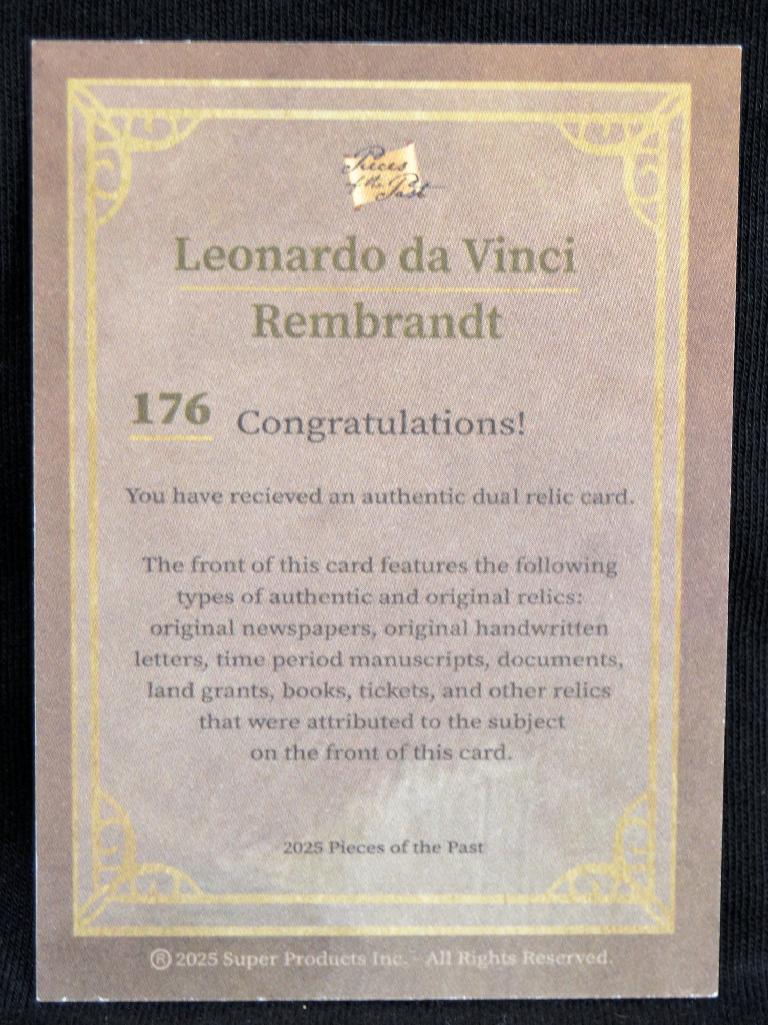 Card featuring Leonardo da Vinci and Rembrandt with text about receiving an authentic dual relic card.