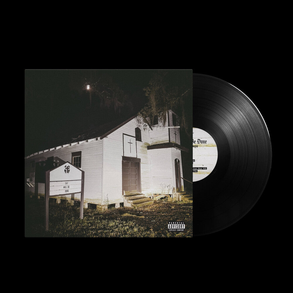 Vinyl record with a cover featuring a white church building at night.
