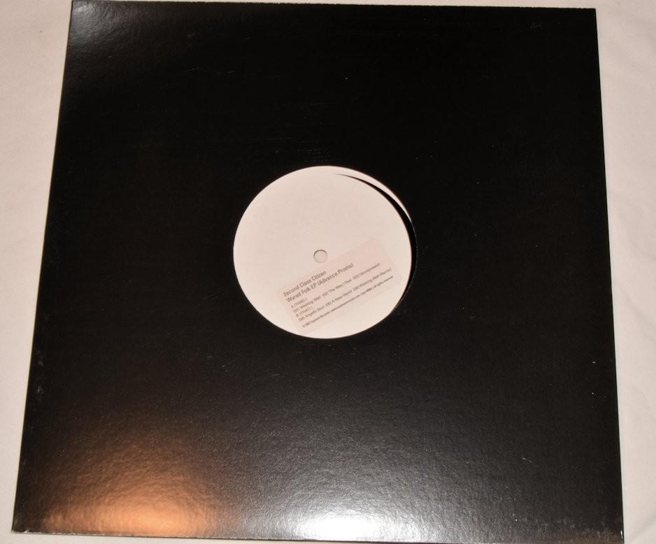 Black vinyl record album cover with a white label in the center.
