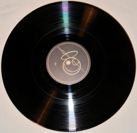 Vinyl record cover for Bauhaus - Swing The Heartache - The BBC Sessions, featuring a blue abstract design.