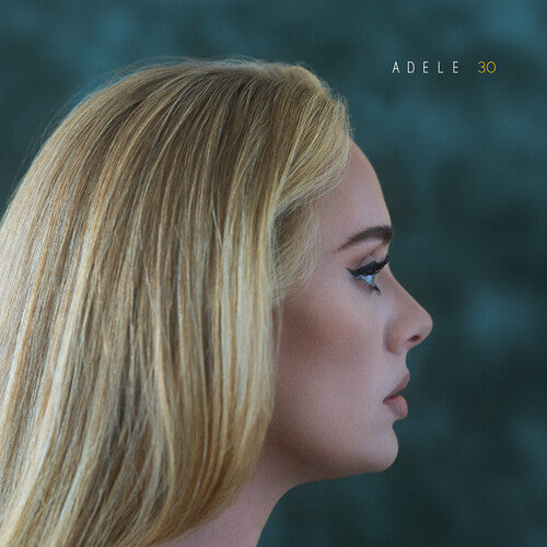 A vinyl record album cover featuring a profile picture of the artist Adele with the album title '30' above her name.