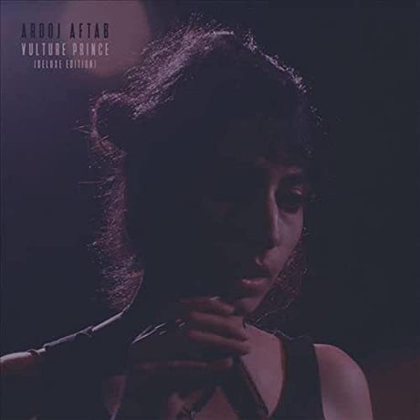 Cover art for the vinyl record 'Aftab, Arooj - Vulture Prince'. Features a person with their hands clasped in front of their face, with a dark and moody aesthetic.