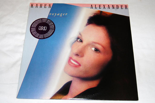 Vinyl record cover featuring a portrait of a female singer-songwriter, with the album title 'Voyager' and the artist's name 'Karen Alexander' printed on the cover.