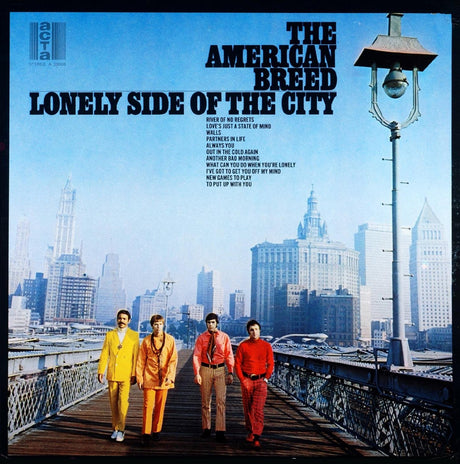 The image shows the cover of the vinyl record 'American Breed - Lonely Side Of The City.' It features a photograph of the band members standing on a bridge, with a cityscape in the background.