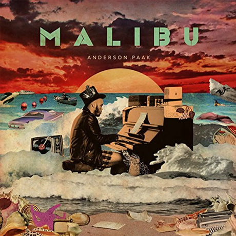 Album cover art for Anderson .Paak - Malibu featuring a stylized illustration with an ocean background, a piano, and the artist sitting on a bench.
