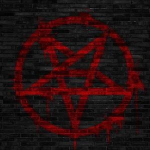 Red pentagram symbol on a textured black background