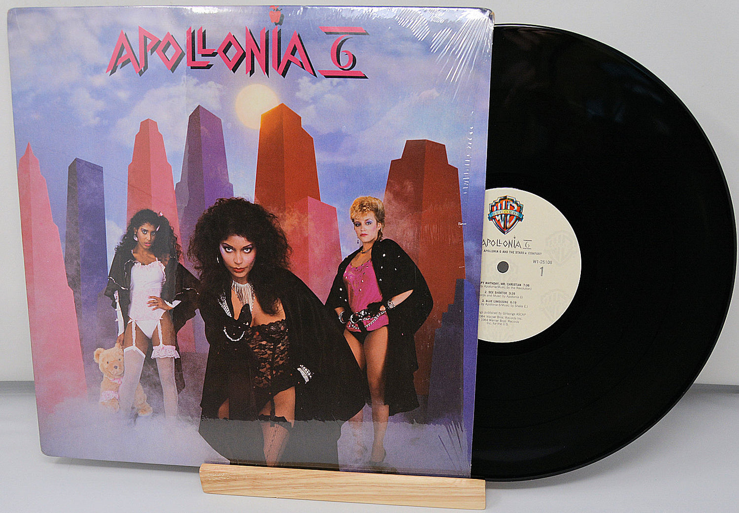 Vinyl record with a colorful cover featuring three women and the title 'Apollonia II'.