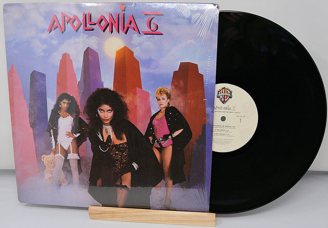 Vinyl record with a colorful cover featuring three women and the title 'Apollonia II'.