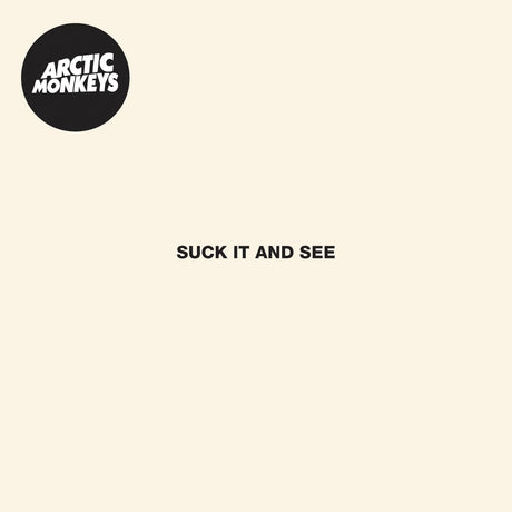 This image presents a minimalist-style album cover for the Arctic Monkeys' fourth album, "Suck It And See". The cover features a plain white background with the band's name in a simple, bold black font at the top.
