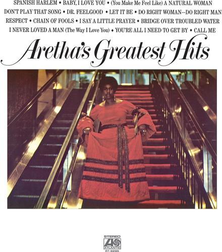 Album cover of Aretha Franklin's 'Aretha's Greatest Hits' with a woman on an escalator.