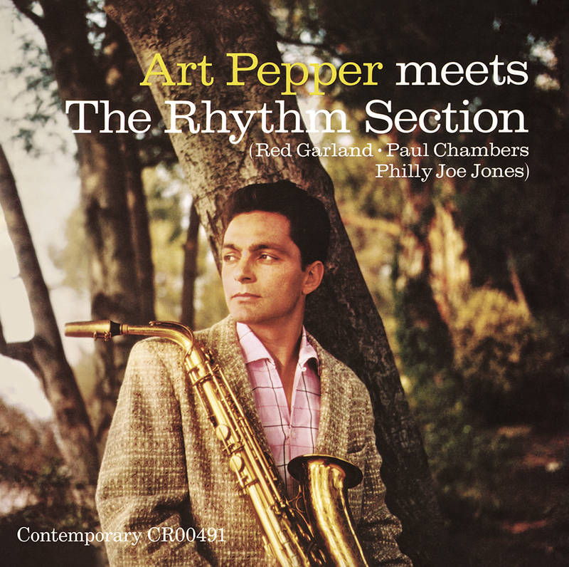 Album cover featuring a man with a saxophone in a forest setting, with text about Art Pepper and The Rhythm Section.