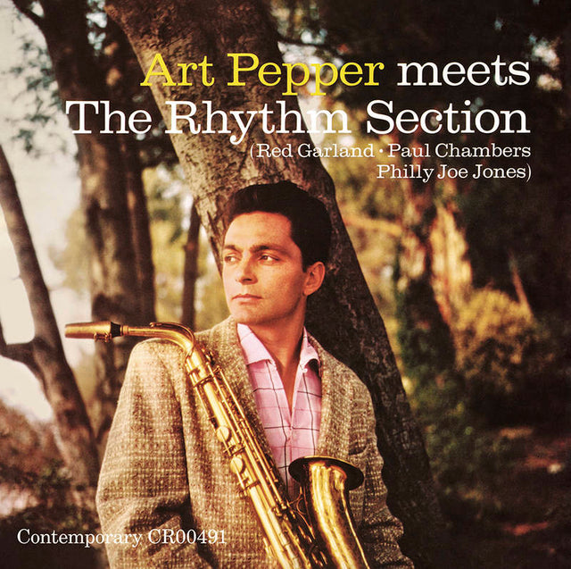 Album cover featuring a man with a saxophone in a forest setting, with text about Art Pepper and The Rhythm Section.