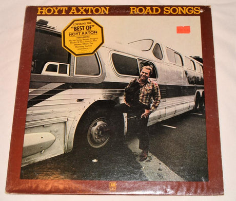 Vinyl record cover for Hoyt Axton's 'Road Songs' album, featuring a photograph of a motorhome with the artist standing beside it.