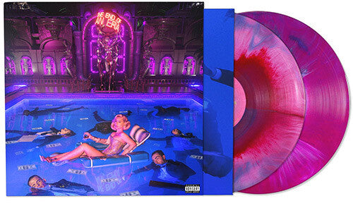 People lounging in a pool with a neon sign and decorative architecture in the background