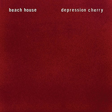 Beach House - Depression Cherry This image features the album cover for "Depression Cherry" by Beach House, their fifth full-length record. The cover art is minimalist, utilizing a deep red background with white text that clearly displays the album name and artist.