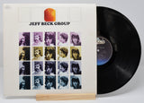 A vinyl record titled 'Jeff Beck Group' with a colorful band photo on the cover.