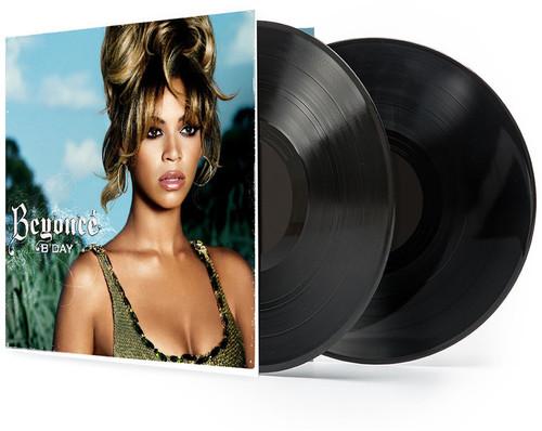 A vinyl record album cover for Beyonce's album 'B'Day' featuring Beyonce's portrait and the album title.