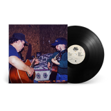 Vinyl record by Billy Strings also showing the album cover with a boy and his Dad playing acoustic guitars.