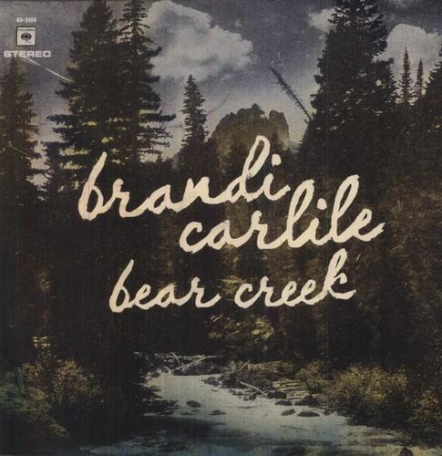 Album cover with forest scene and 'brandi carlile bear creek' text