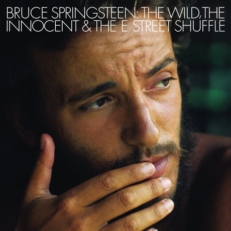 Album cover with a close-up of a person's face and text about Bruce Springsteen's album.