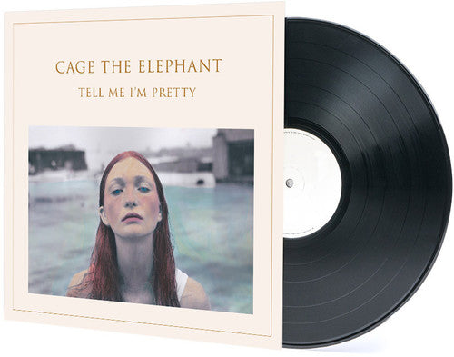 Limited edition vinyl record of Cage The Elephant's album 'Tell Me I'm Pretty', with a black and white image of a woman with red hair on the cover.