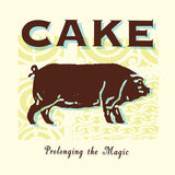 Album cover art for Cake's album 'Prolonging The Magic' featuring a stylized illustration of a pig in brown on a beige background with blue decorative elements.