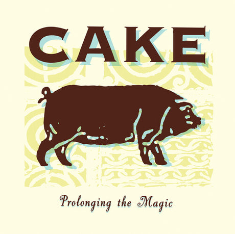 Album cover art for Cake's album 'Prolonging The Magic' featuring a stylized illustration of a pig in brown on a beige background with blue decorative elements.