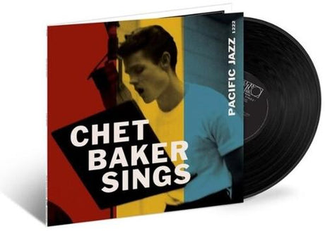 Vinyl record with cover featuring 'Chet Baker Sings' on a white background