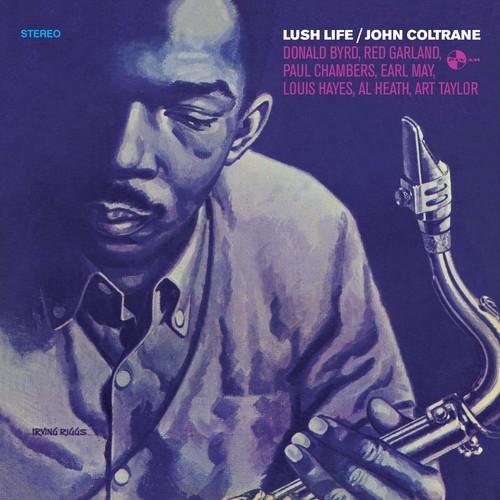 Album cover featuring a portrait of John Coltrane with a saxophone, surrounded by text that lists the album tracks.