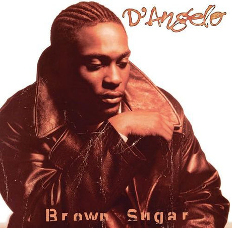 D'Angelo album cover for 'Brown Sugar' featuring a photo of D'Angelo in a leather jacket with a warm, monochrome tone.