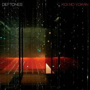 Album cover with abstract design and text 'Deftones Koi No Yokan' on a dark background