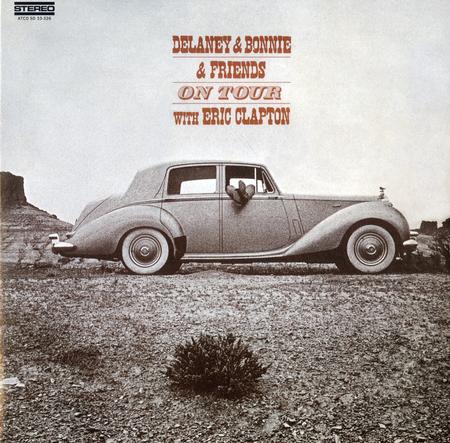 Album cover with vintage car and desert landscape, featuring text about Delaney & Bonnie & Friends and Eric Clapton.