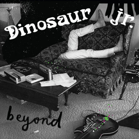 Black and white album cover featuring a couch, chair, and record albums with the text 'Dinosaur Jr. beyond' overlayed.