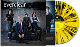Vinyl record with 'everclear' album cover featuring band members and a yellow and black splatter design.