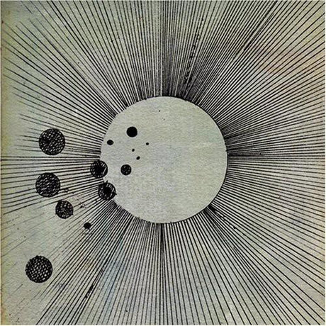 Abstract pattern resembling a cosmic or celestial motif, possibly representing the artwork for the Flying Lotus album 'Cosmogramma'.