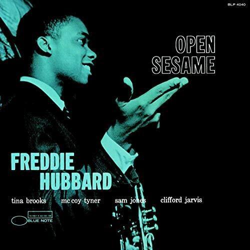 Album cover featuring a jazz musician with text 'Open Sesame' and 'Freddie Hubbard' on a black background.