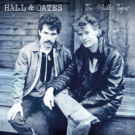 Album cover featuring two individuals sitting on a bench with 'Hall & Oates The Philly Tapes' text.