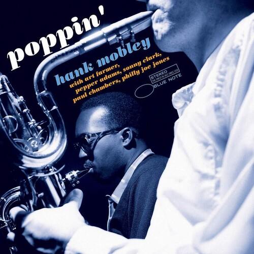 Album cover with a saxophonist playing a saxophone, featuring text about Hank Mobley and Blue Note Records.