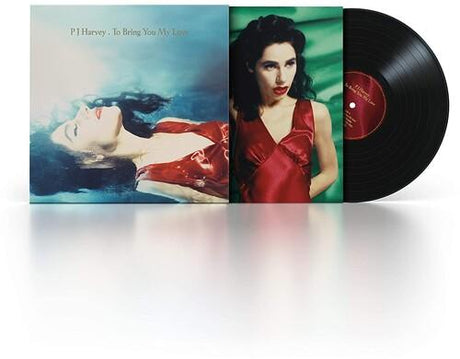 Album cover art featuring a person lying on their back in water with a red garment covering their lower body. The title 'P J Harvey .